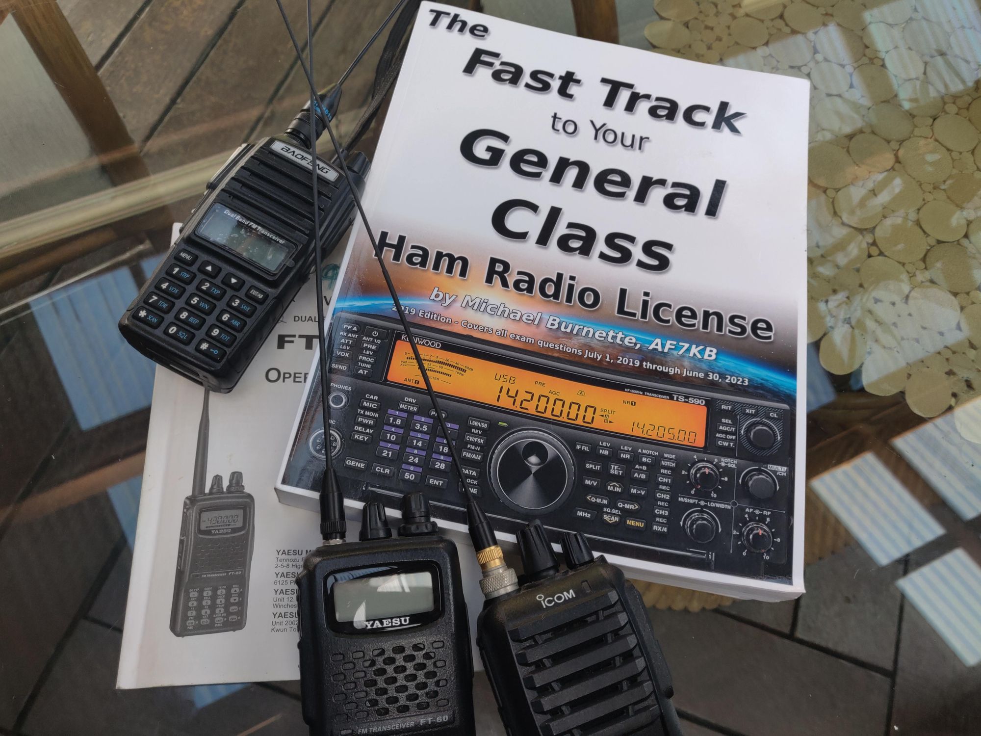 Handheld radios and the book The Fast Track to your General Class Ham Radio License